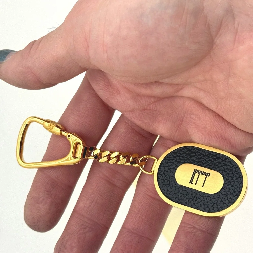 Dunhill Made in Italy Gold-Tone & Black Textured Leather Oval Keychain Key Fob‎